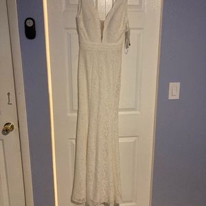 Xscape cream colored mermaid dress size 2